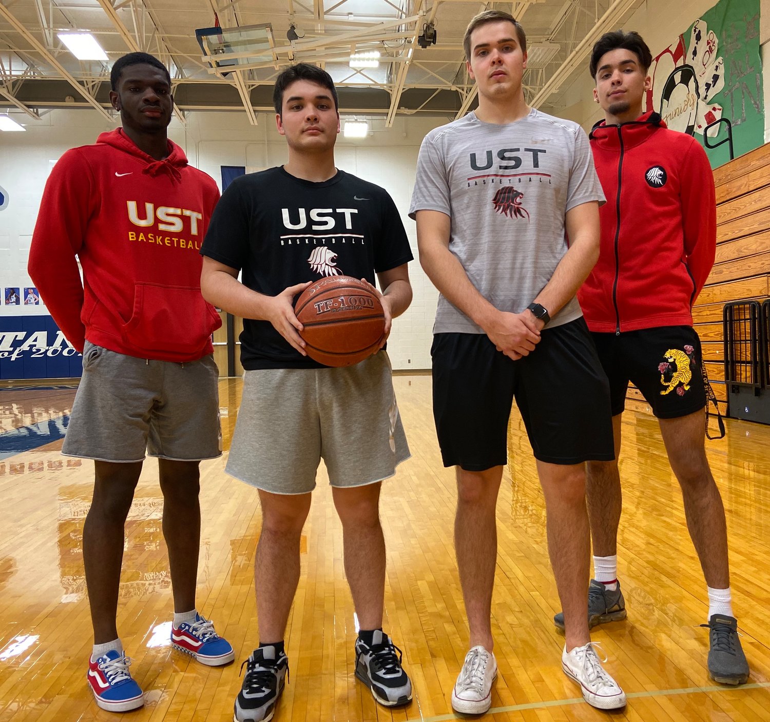 From left to right, Katy natives Andrew Adebo, Austin Arnold, Nathan Thormaehlen and Nestor Daboin are part of a blossoming University of St. Thomas men’s basketball program.